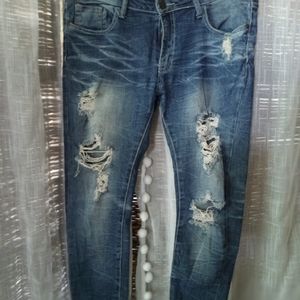Machine distressed jeans